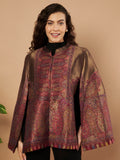 Woman wearing the Maira Moonlight Kaani Cape Jacket with intricate Kashmiri paisley weave and elegant cape silhouette.