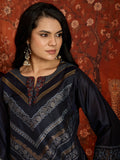 Woman wearing the Neelzar Zari Woven Co-Ord Set in navy blue featuring intricate zari-woven motifs and matching trousers, styled for festive and contemporary occasions.