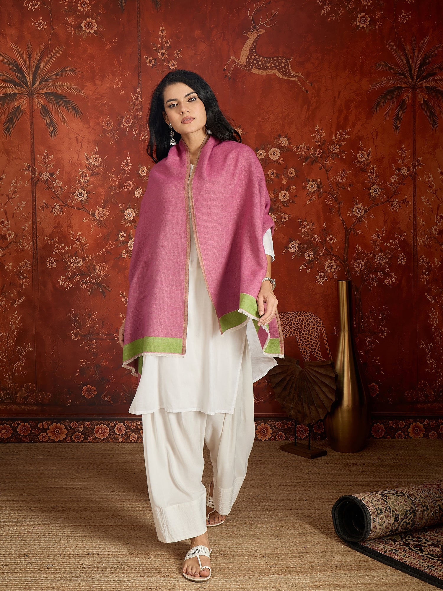 Reversible women's stole in rose pink and pistachio green, crafted in a soft cashmere-feel weave with elegant contrast borders, styled in two different ways.