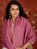 Reversible women's stole in rose pink and pistachio green, crafted in a soft cashmere-feel weave with elegant contrast borders, styled in two different ways.