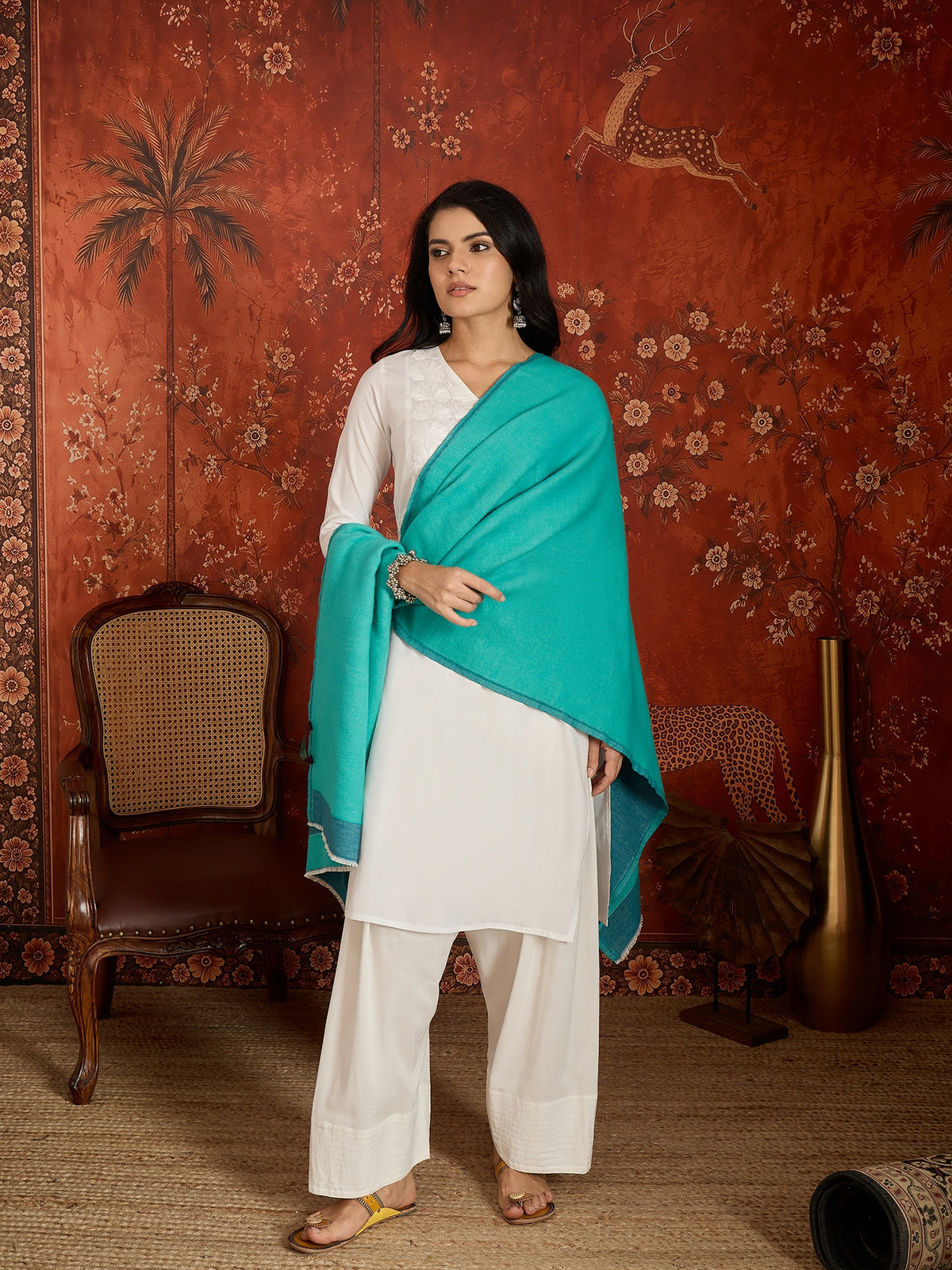 Reversible aqua blue and teal blue cashmere-feel stole for women with a soft drape and elegant dual-tone design, styled in two different ways.